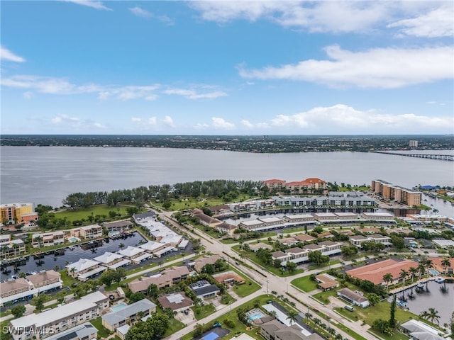 birds eye view of property featuring a water view