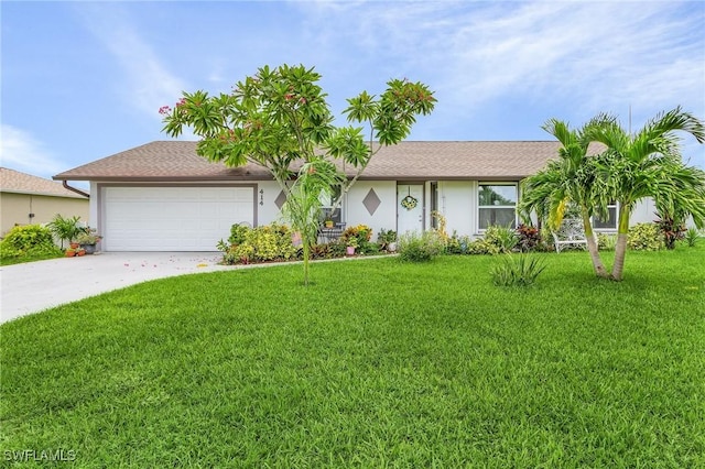 single story home featuring a garage, concrete driveway, a front lawn, and stucco siding