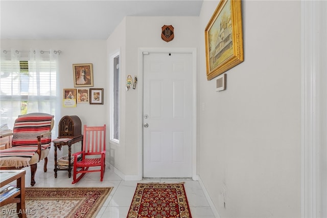 entrance foyer featuring light tile patterned flooring