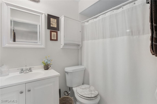 full bath featuring toilet and vanity