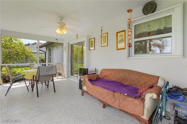 sunroom / solarium with ceiling fan