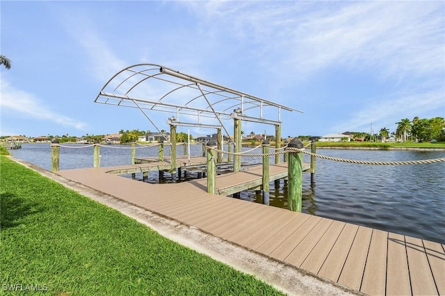 view of dock with a water view and boat lift