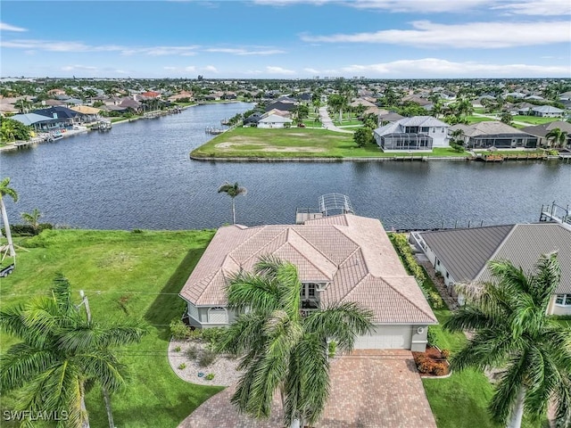 bird's eye view with a water view and a residential view