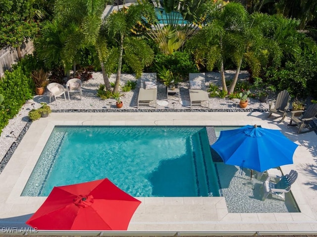 outdoor pool featuring a patio area