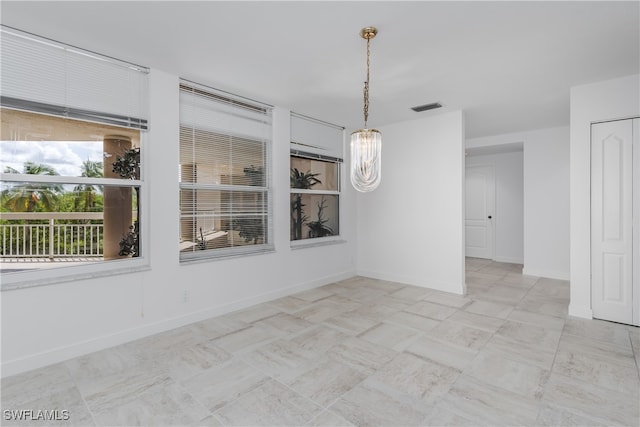 view of tiled spare room