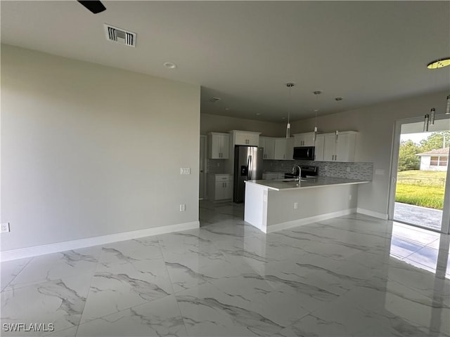 kitchen featuring stainless steel refrigerator with ice dispenser, white cabinetry, kitchen peninsula, pendant lighting, and decorative backsplash