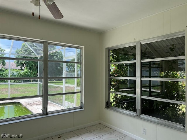 interior space featuring ceiling fan