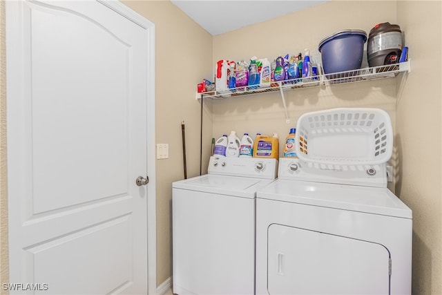 laundry area with washer and dryer