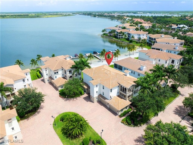 aerial view with a water view and a residential view