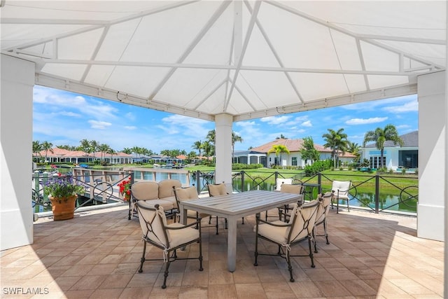 view of patio / terrace with a water view