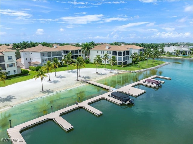 exterior space with a water view and a residential view