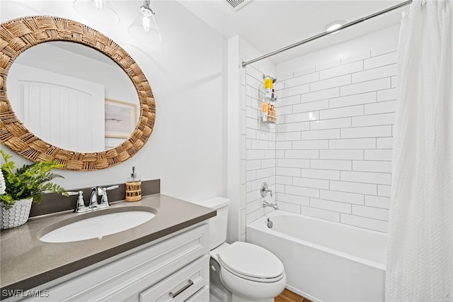 full bathroom featuring vanity, toilet, and shower / bath combo