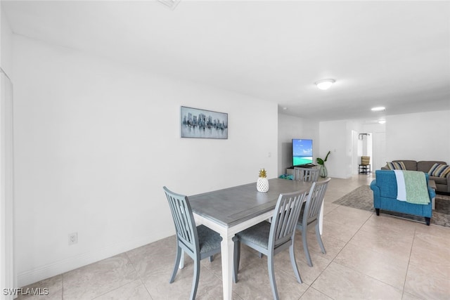 view of tiled dining space