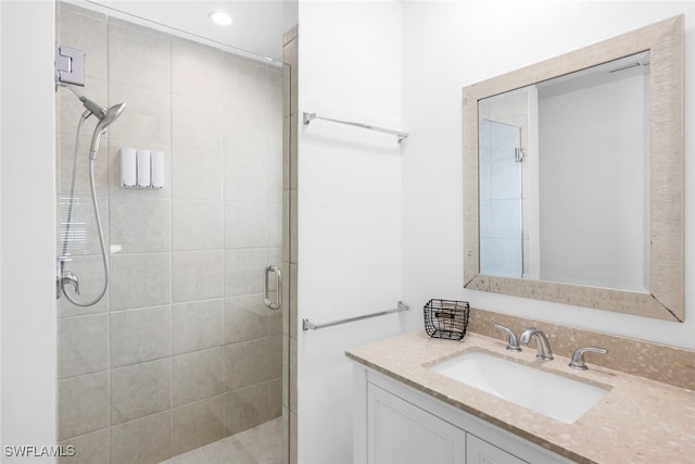 bathroom featuring vanity and walk in shower