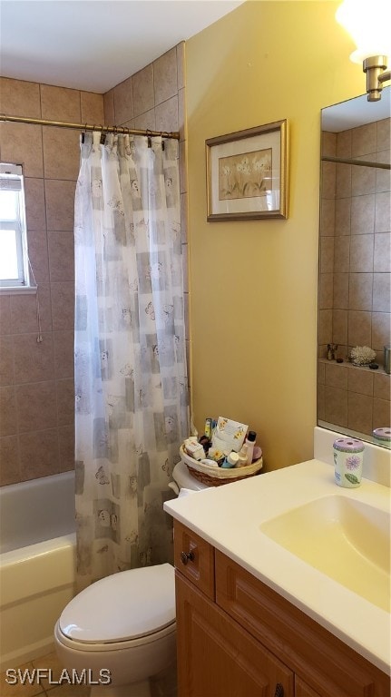 full bathroom featuring vanity, toilet, and shower / bath combo with shower curtain