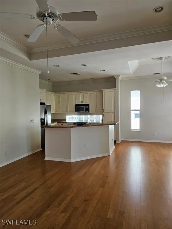 kitchen with ornamental molding, light hardwood / wood-style flooring, and ceiling fan