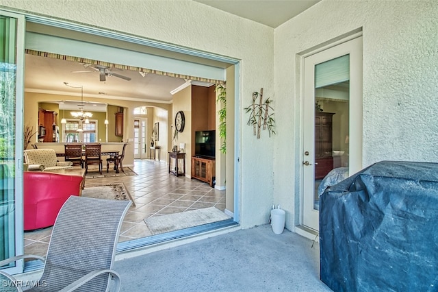 interior space featuring ceiling fan