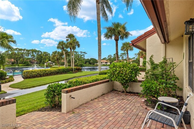 view of patio / terrace with a water view