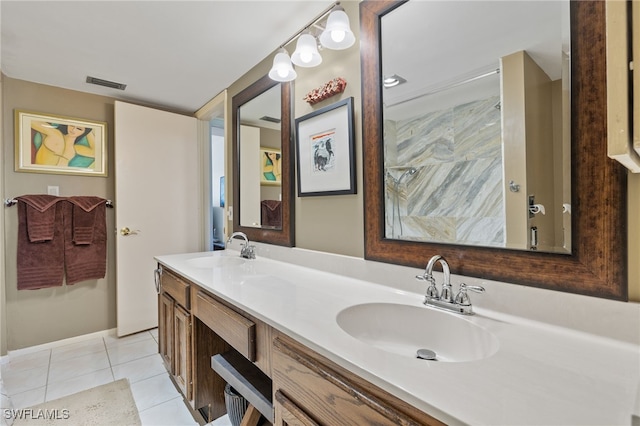 bathroom featuring double vanity and tile patterned floors