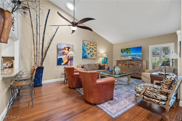 living room with ceiling fan, high vaulted ceiling, and hardwood / wood-style floors