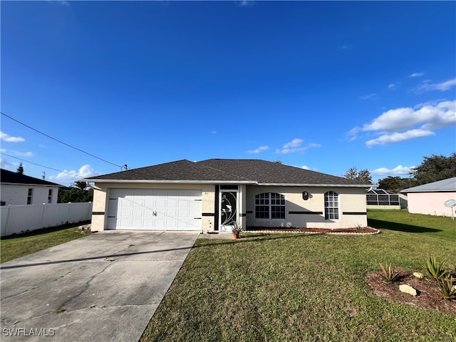 single story home featuring a front lawn and a garage