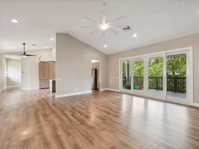 unfurnished living room with ceiling fan, light wood-style flooring, visible vents, and baseboards