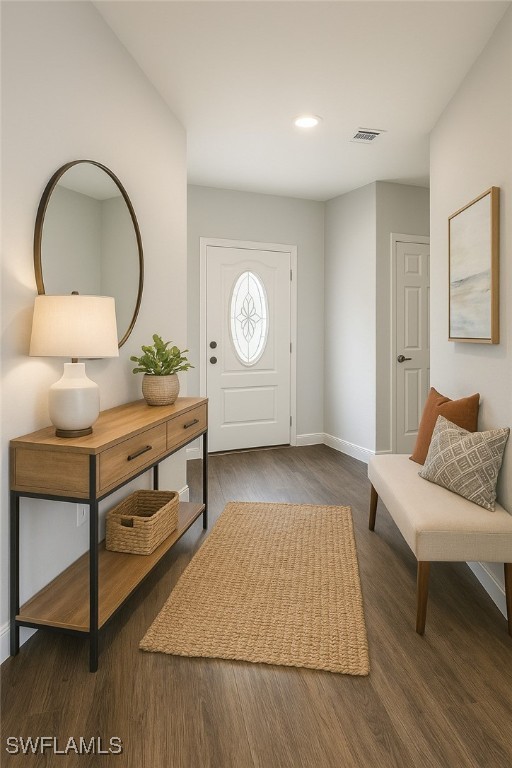 603 Marcella Ter, Labelle, FL 33935 - entrance foyer featuring wood finished floors, visible vents, baseboards, and recessed lighting