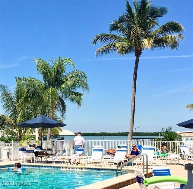 view of swimming pool with a patio area