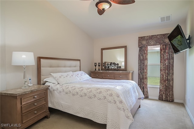 carpeted bedroom featuring ceiling fan and lofted ceiling