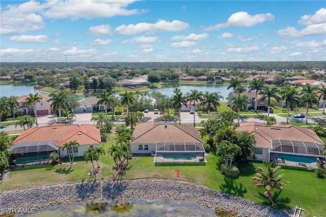 aerial view featuring a water view and a residential view