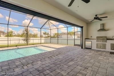 view of swimming pool featuring ceiling fan