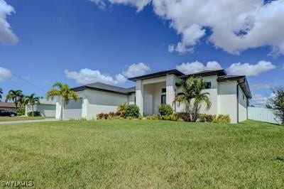 view of front of house with a front yard