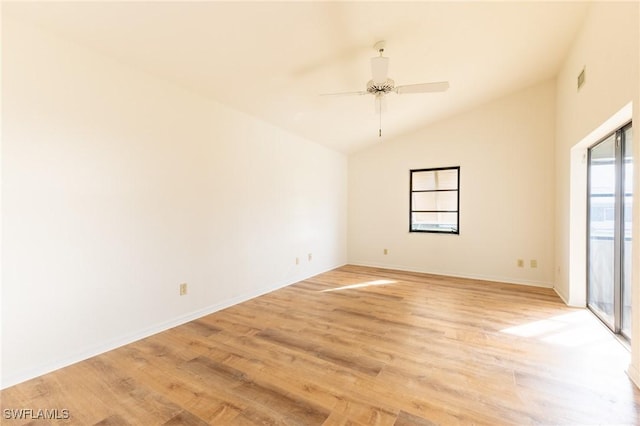 unfurnished room featuring ceiling fan, plenty of natural light, lofted ceiling, and light hardwood / wood-style flooring