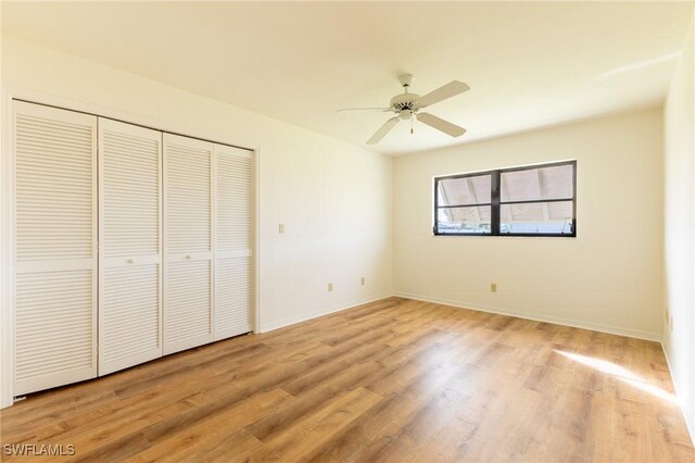 unfurnished bedroom featuring light hardwood / wood-style floors and ceiling fan