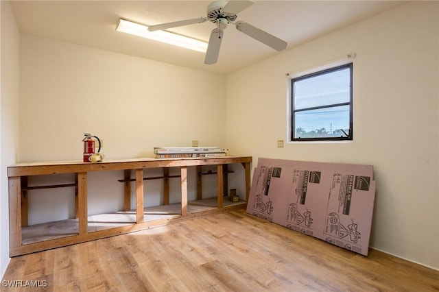 interior space with hardwood / wood-style flooring and ceiling fan