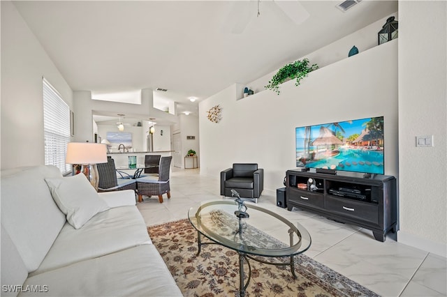 living room with ceiling fan