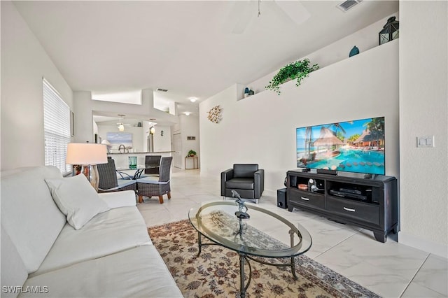 living room with lofted ceiling