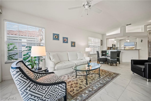 living room featuring ceiling fan