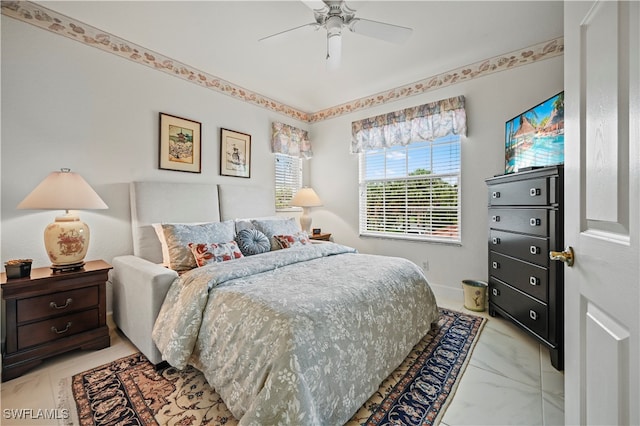 bedroom featuring ceiling fan