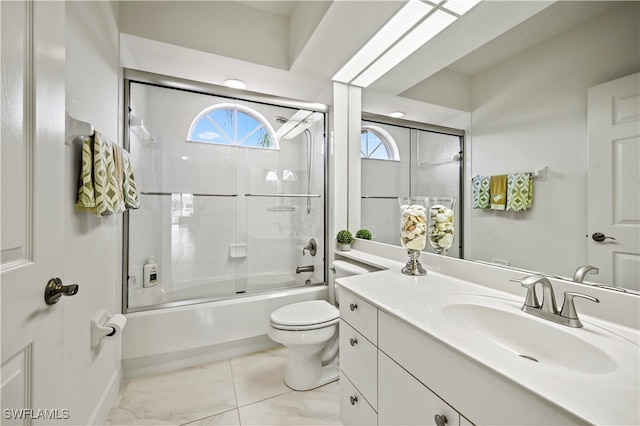 full bathroom with toilet, bath / shower combo with glass door, tile patterned floors, and vanity