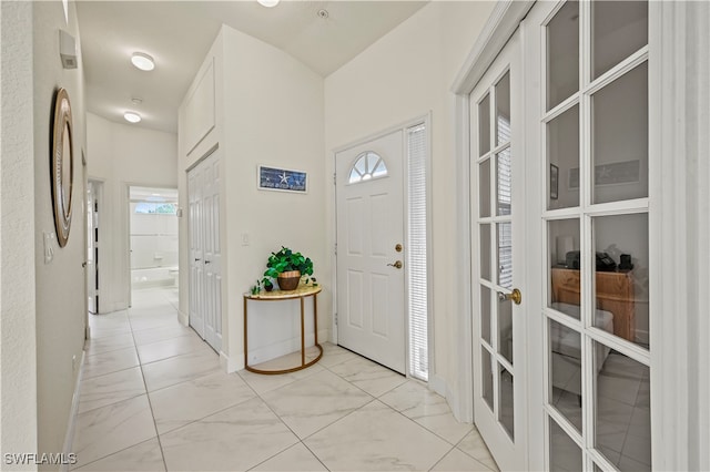 foyer entrance featuring plenty of natural light