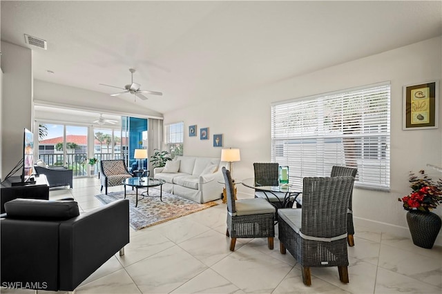 living room with lofted ceiling