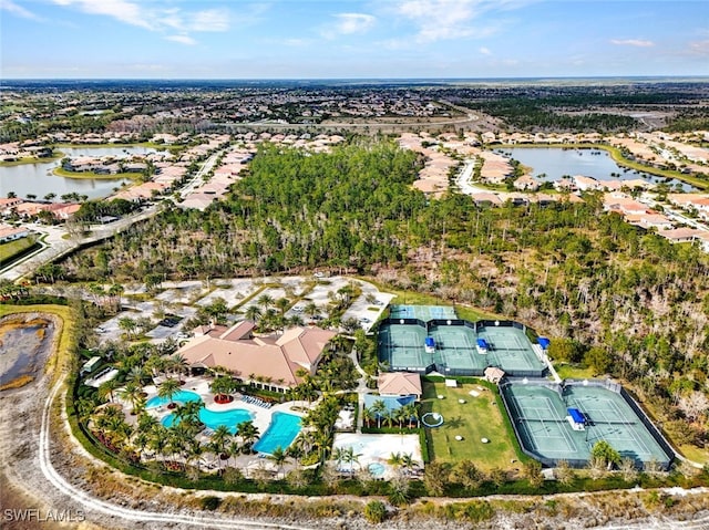 drone / aerial view with a water view