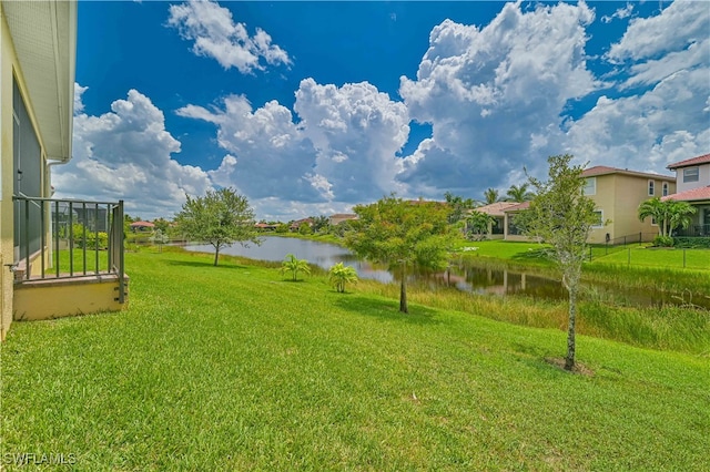 view of yard with a water view