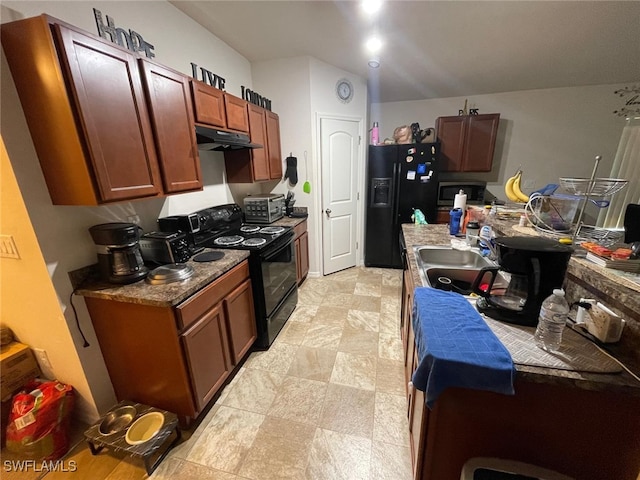 kitchen with sink, black appliances, and light tile patterned floors