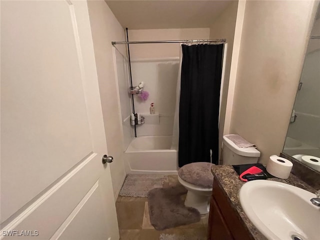 full bathroom featuring tile patterned flooring, vanity, shower / tub combo with curtain, and toilet