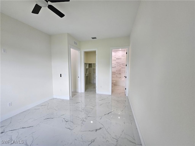 unfurnished room featuring ceiling fan