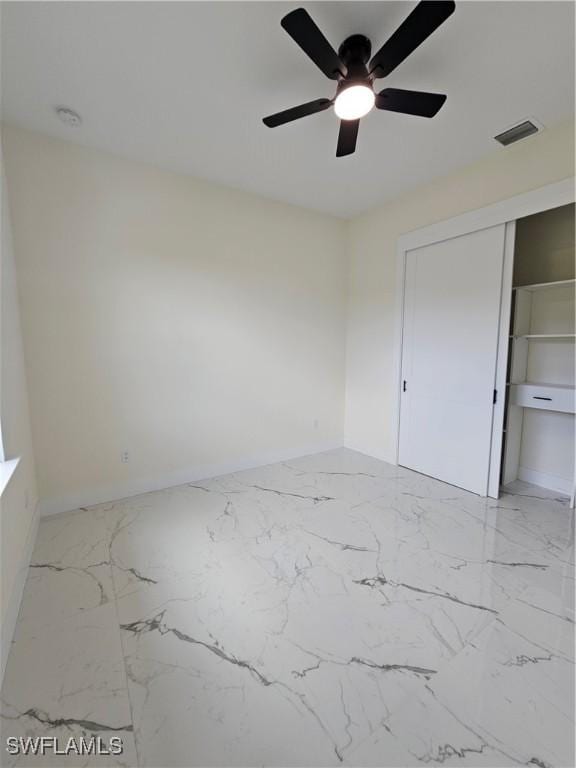 unfurnished bedroom featuring a closet and ceiling fan