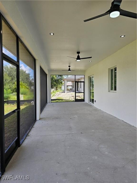 unfurnished sunroom featuring a healthy amount of sunlight