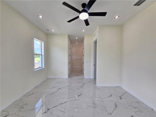 unfurnished room featuring ceiling fan